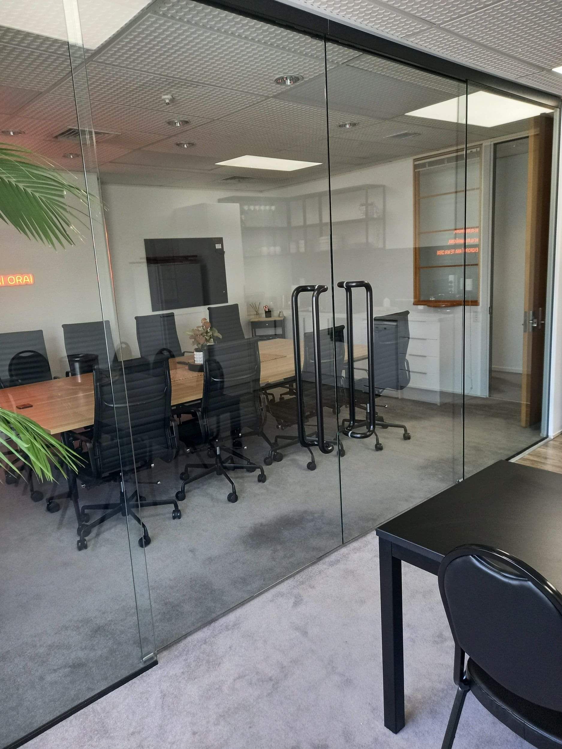 internal glass partition doors for a meeting room