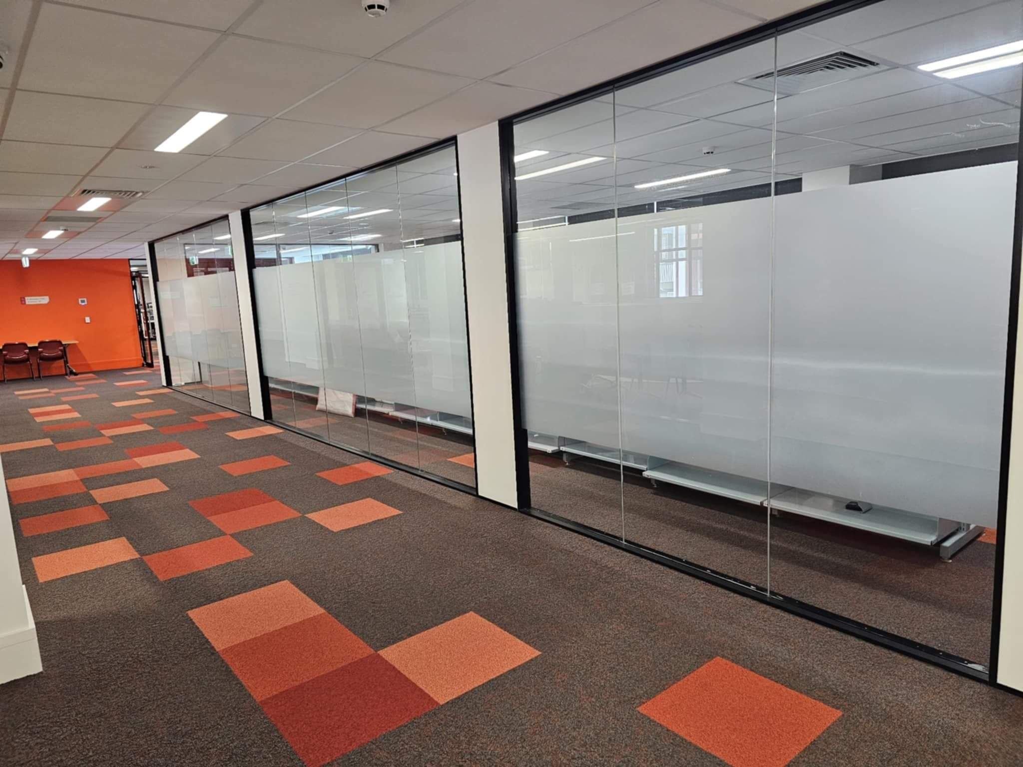 Frosted glass on internal partitions in a workspace