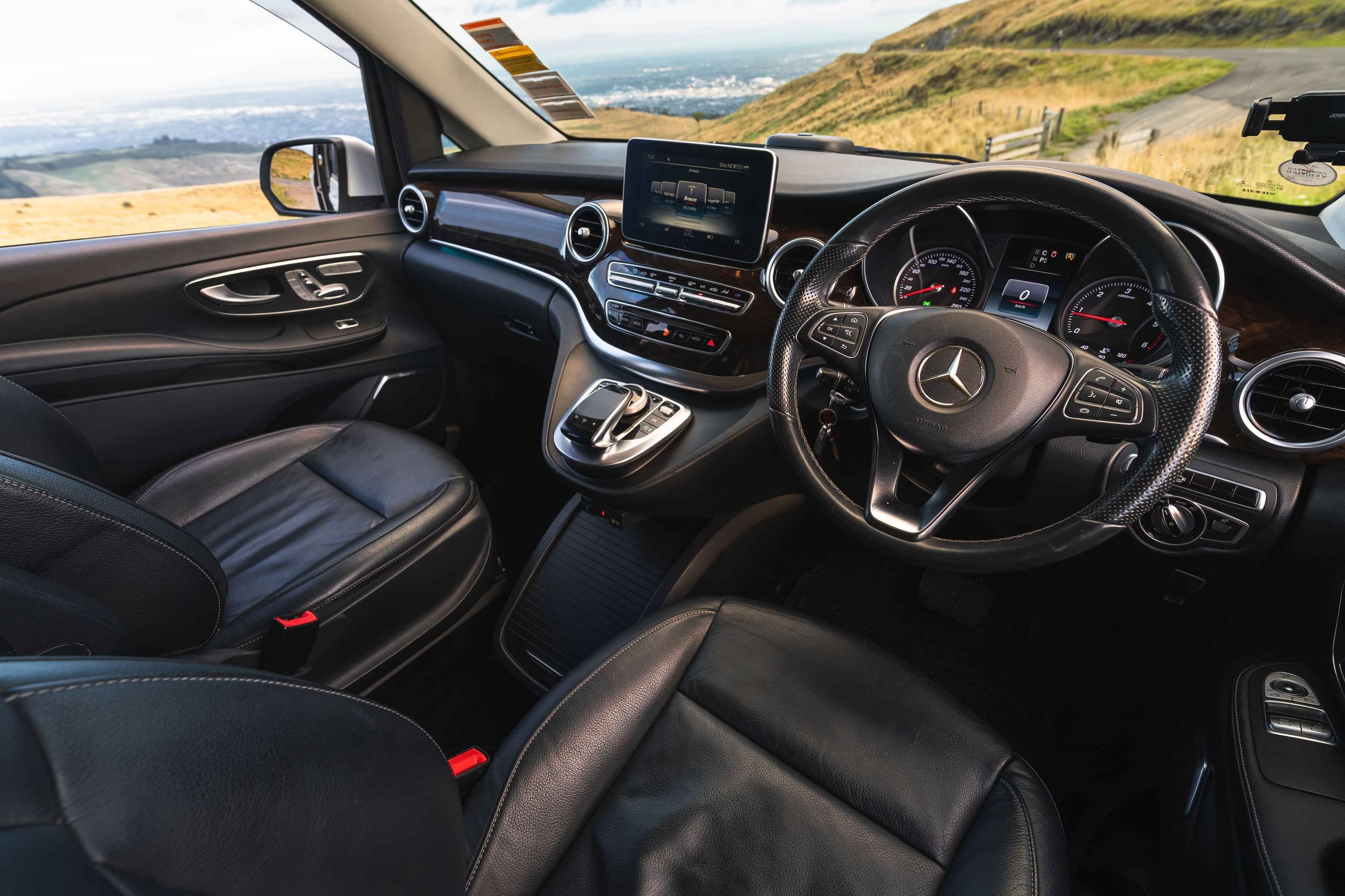 Luxury leather interior of a private driver vehicle used for South Island touring