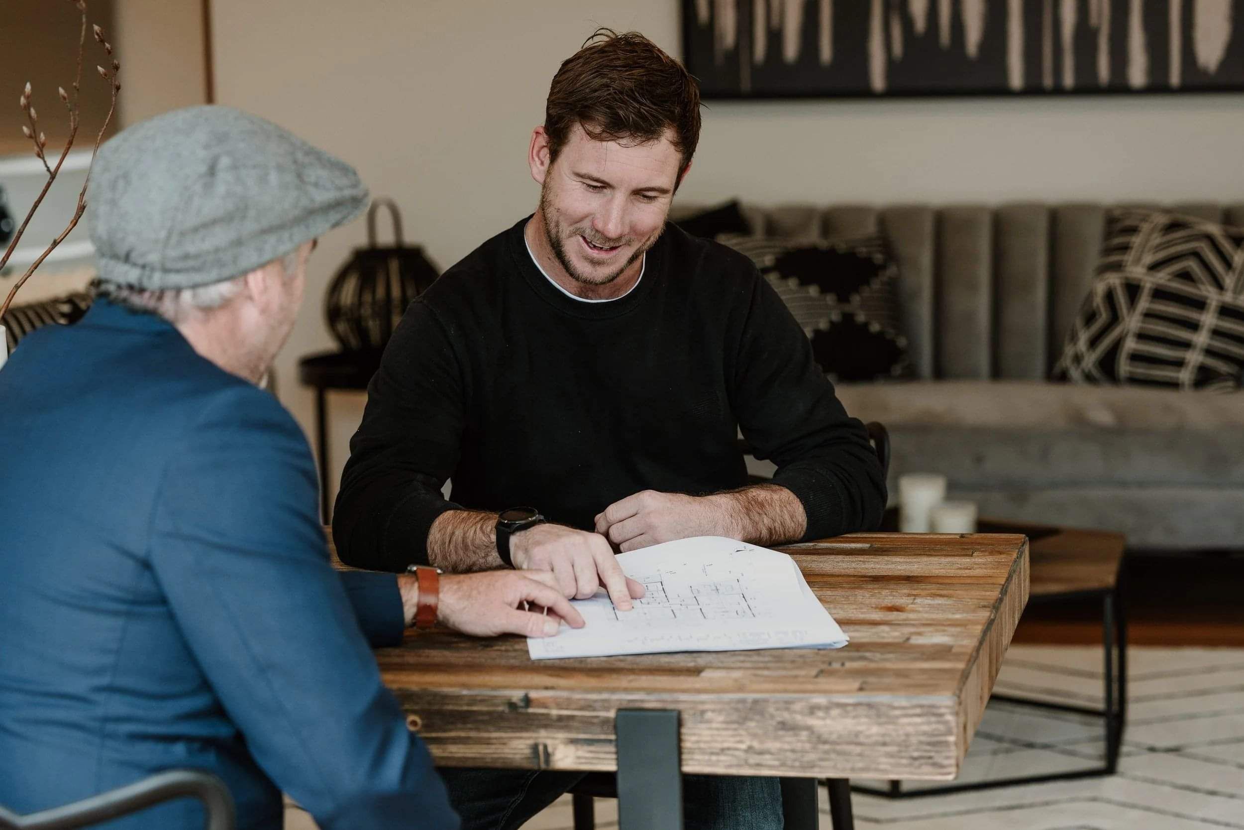 Shaun discussing plans with a client