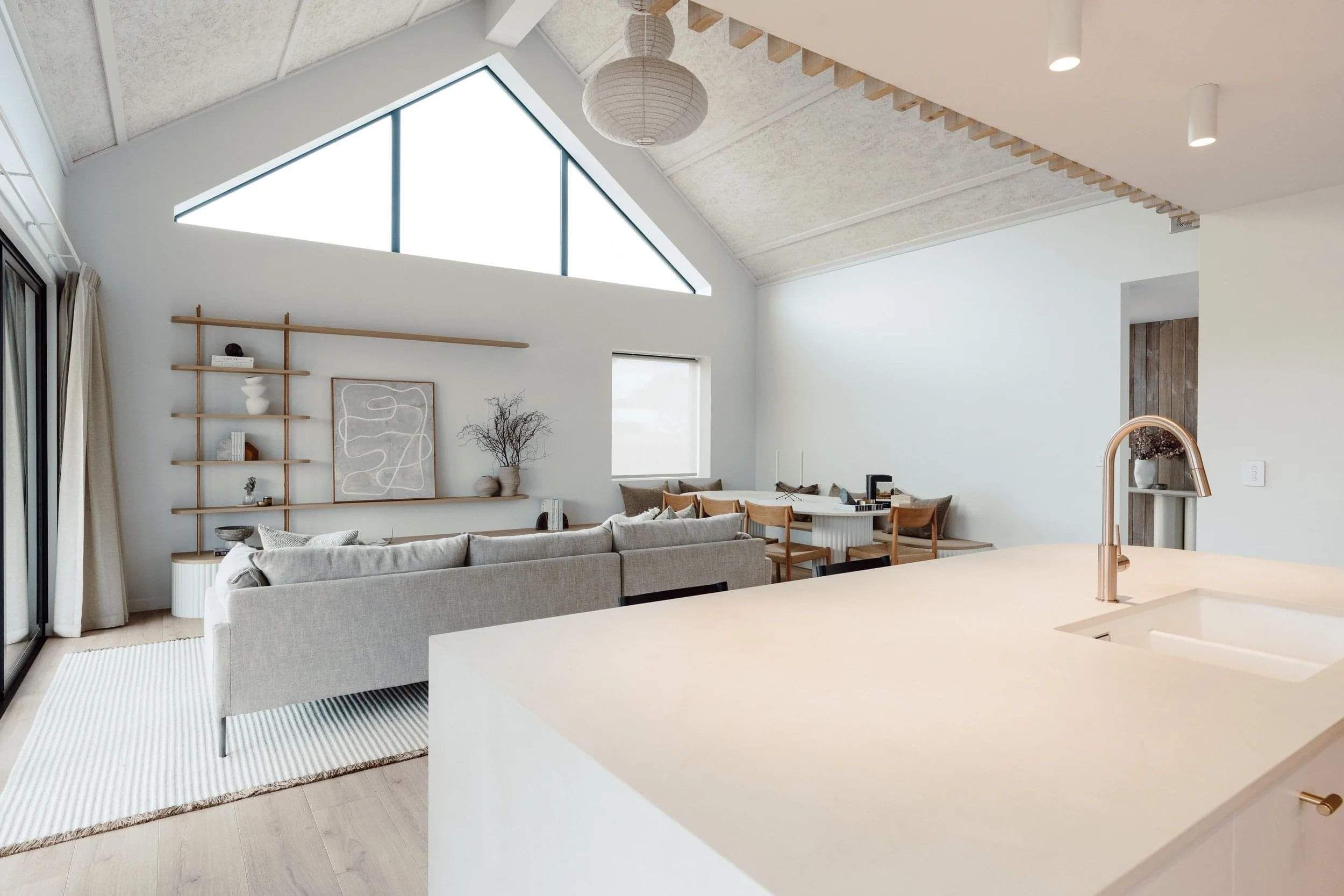 Open plan kitchen and living, dining space of an energy efficient home