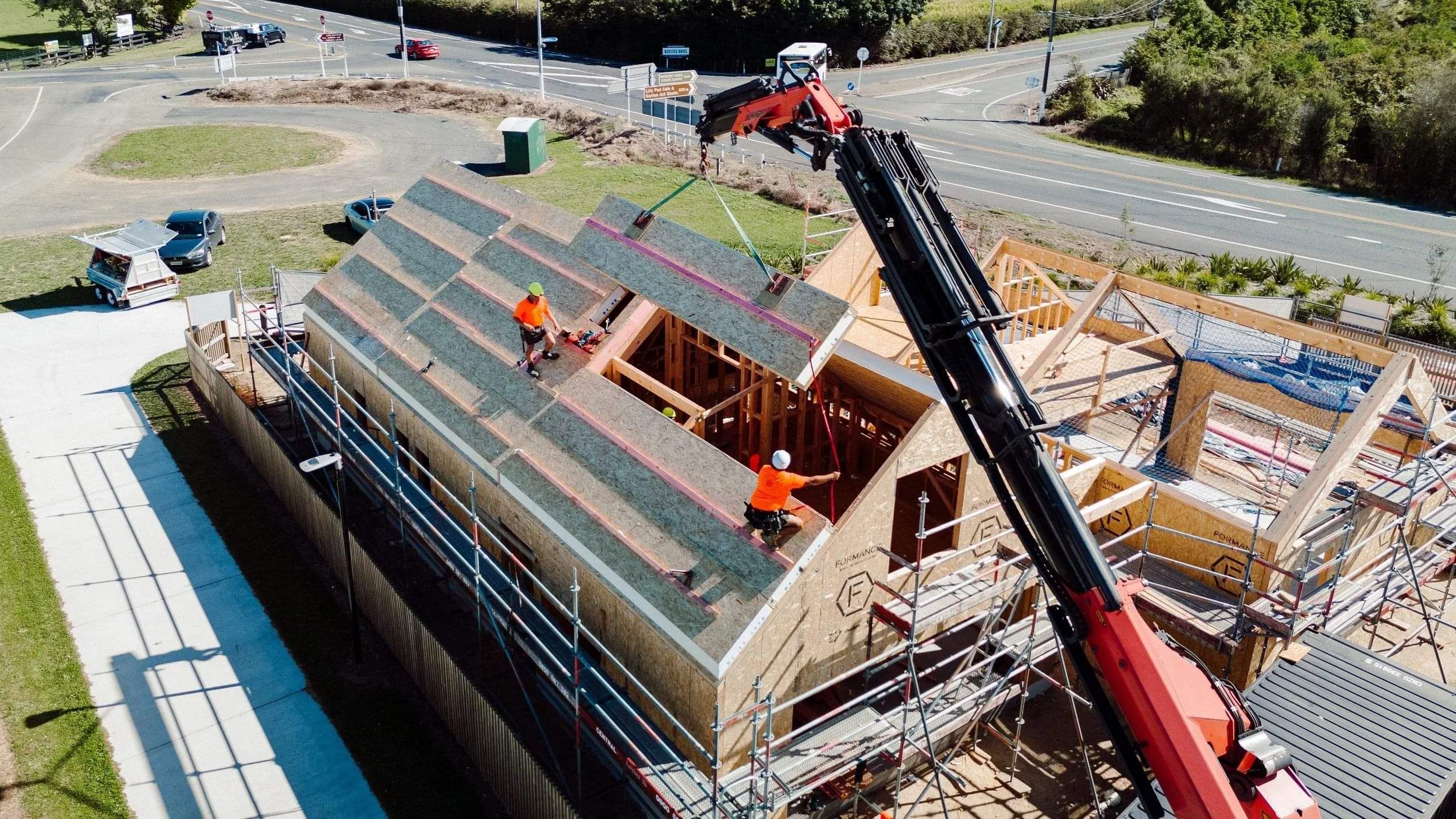 Builders installing SIP panels on an energy efficient home