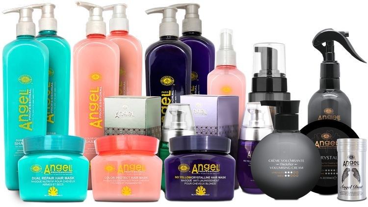 Shampoo bottles and gift sets of Angel Professional products on a display