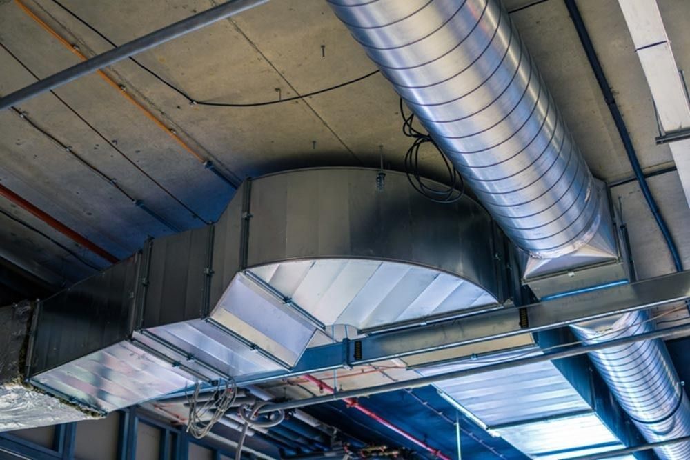 Spiral ventilation ductwork installed in a commercial ceiling