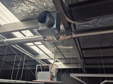 Ducted air conditioning installation in a commercial ceiling space