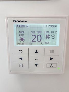 Panasonic air conditioning wall controller set to 20 degrees