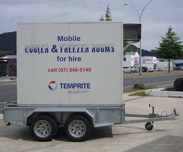 Mobile cooler and freezer room for hire on a trailer, with Temprite signage