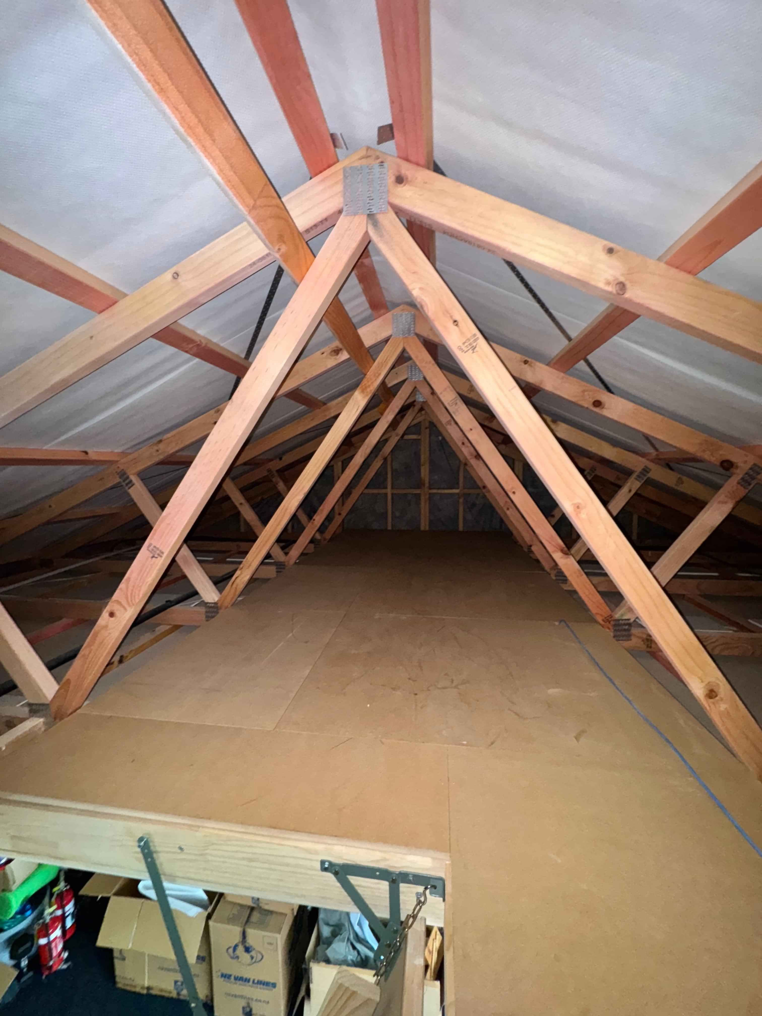 Finished attic flooring for roof space storage
