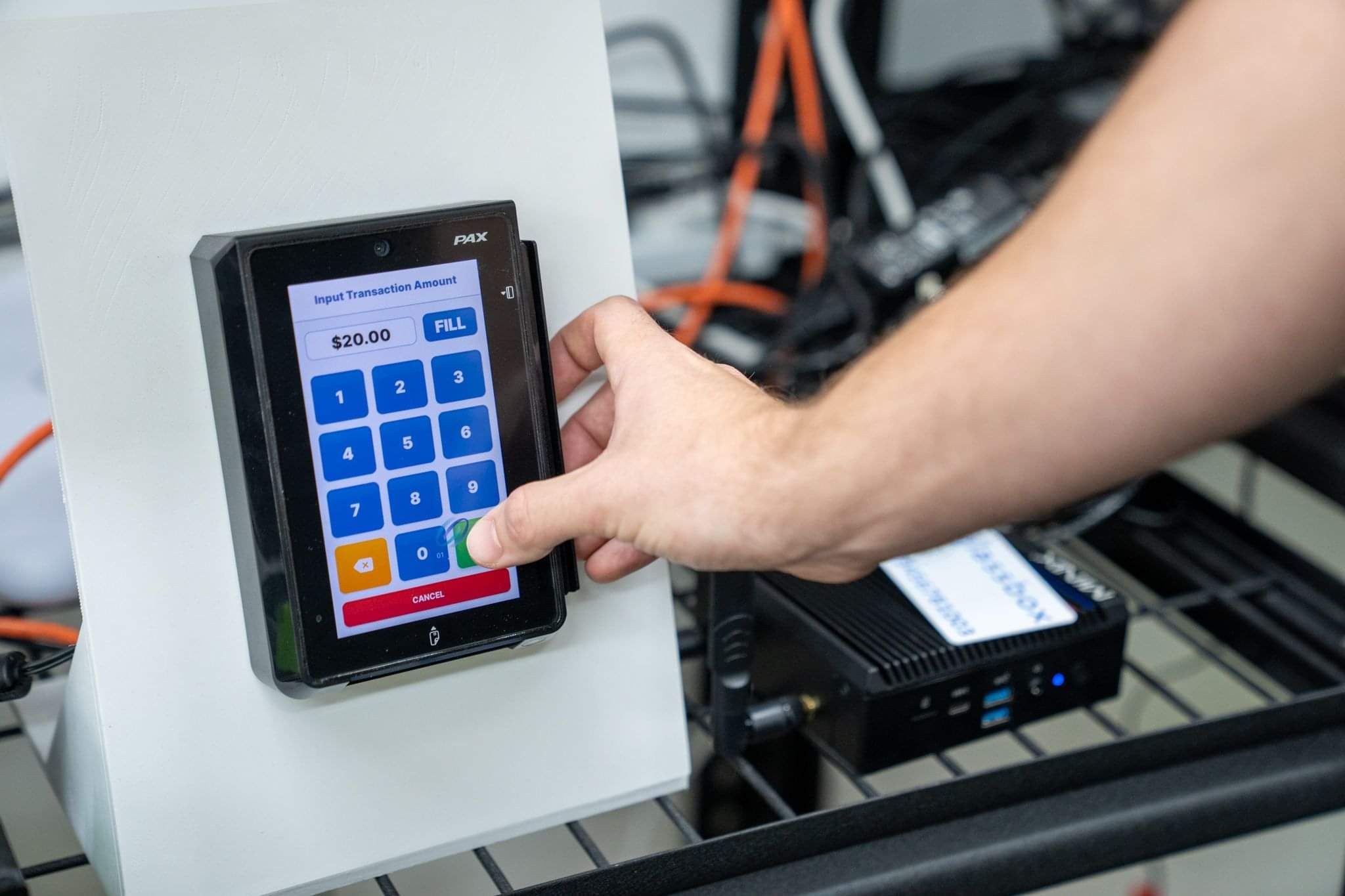 Glassbox outdoor payment terminal for self-service fuel transactions