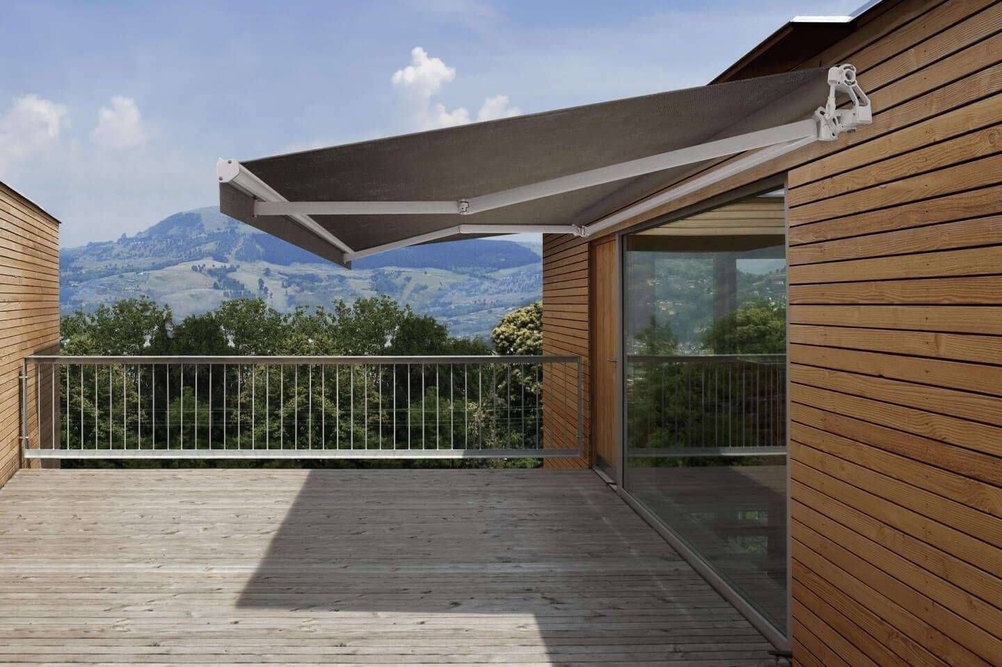 Ellipse Monobloc awning providing shade over a large outdoor deck