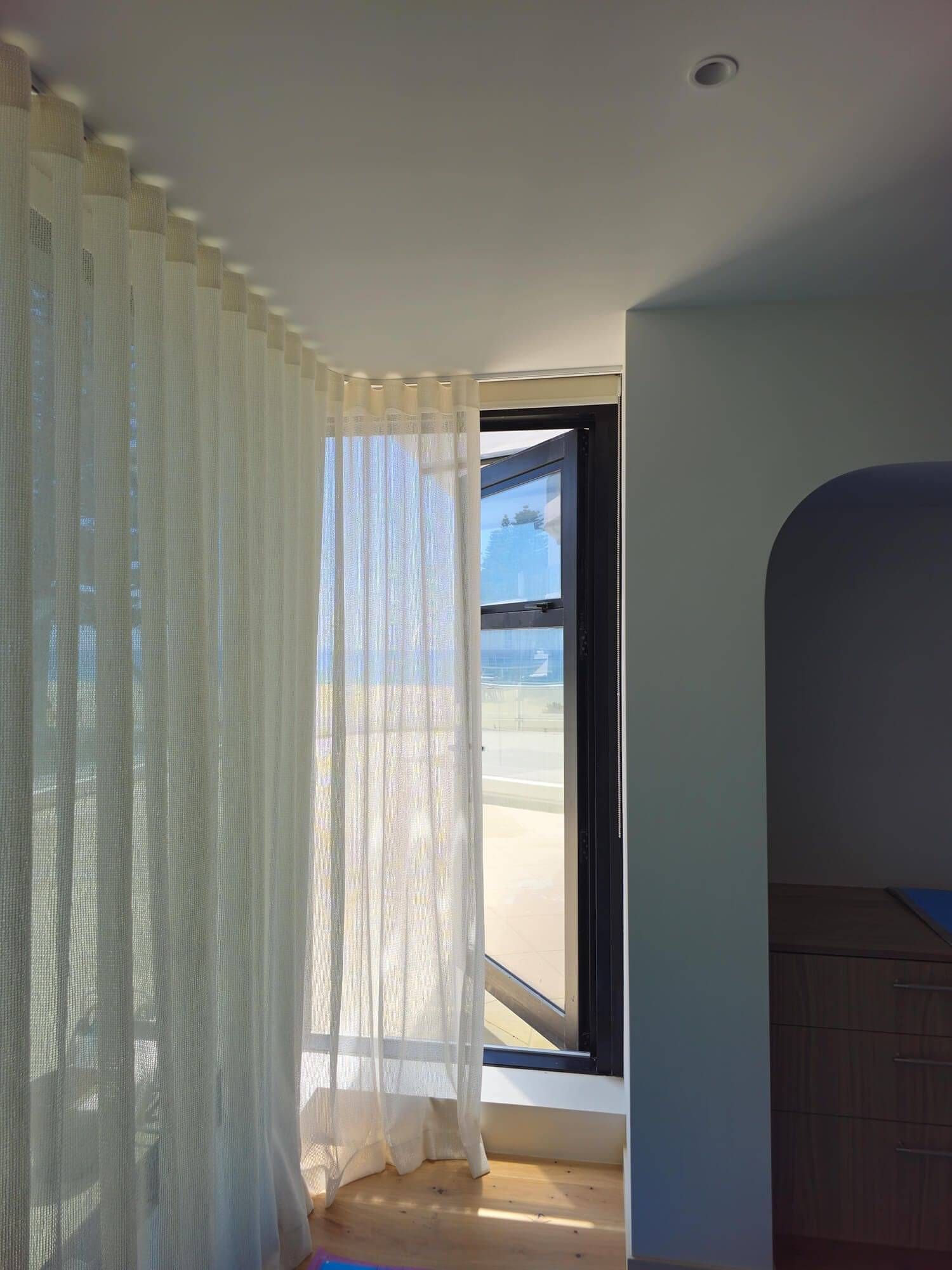 White sheer curtains filtering natural light
