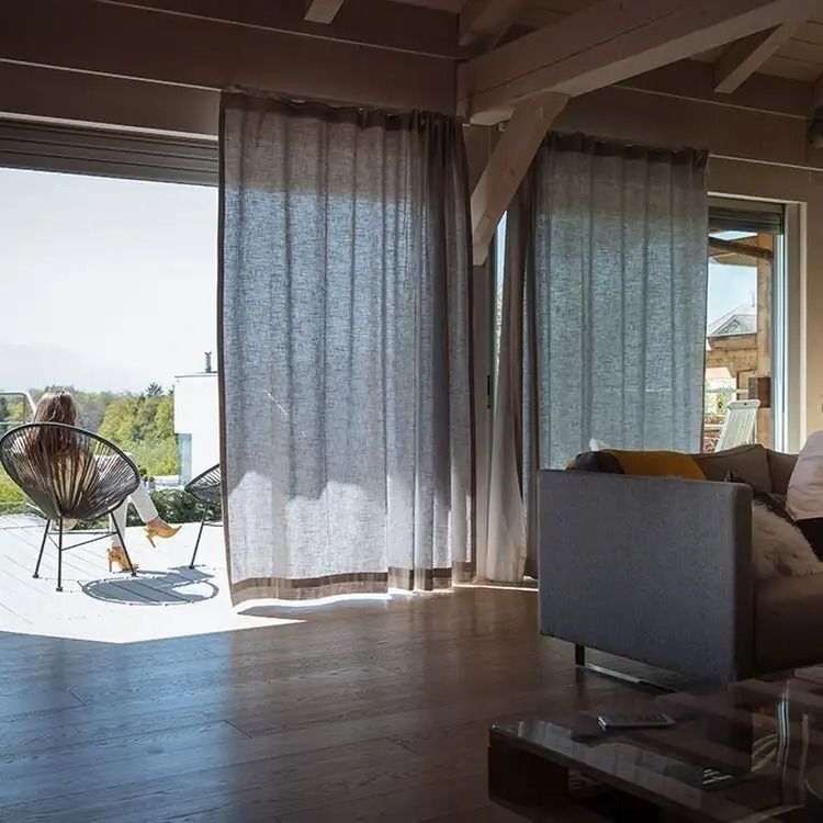 Motorised curtains controlled by remote Somfy