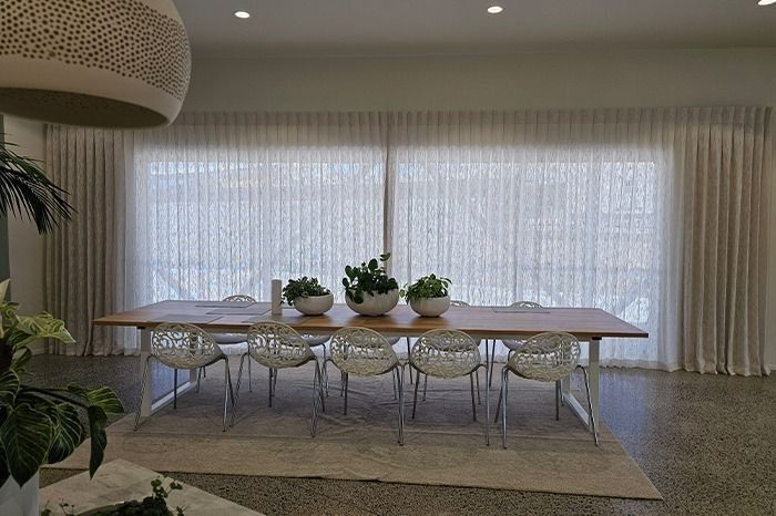 Commercial motorised curtains for light and privacy control
