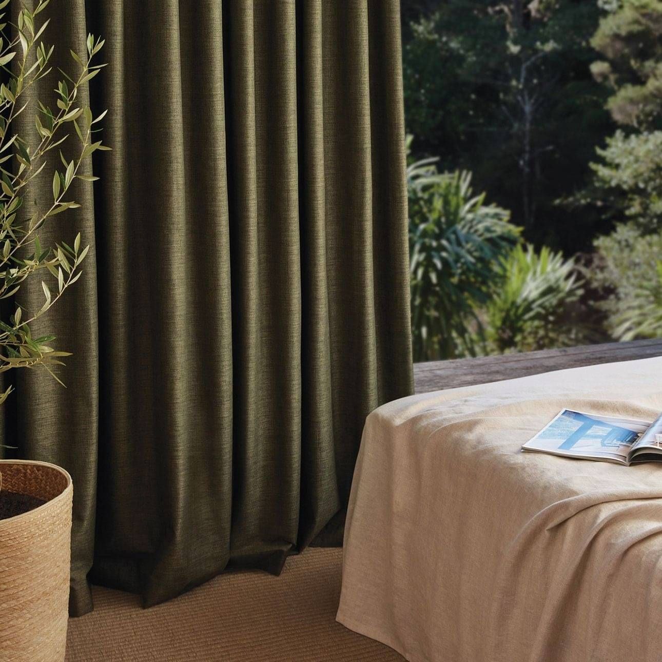 Floor-to-ceiling James Dunlop green curtains