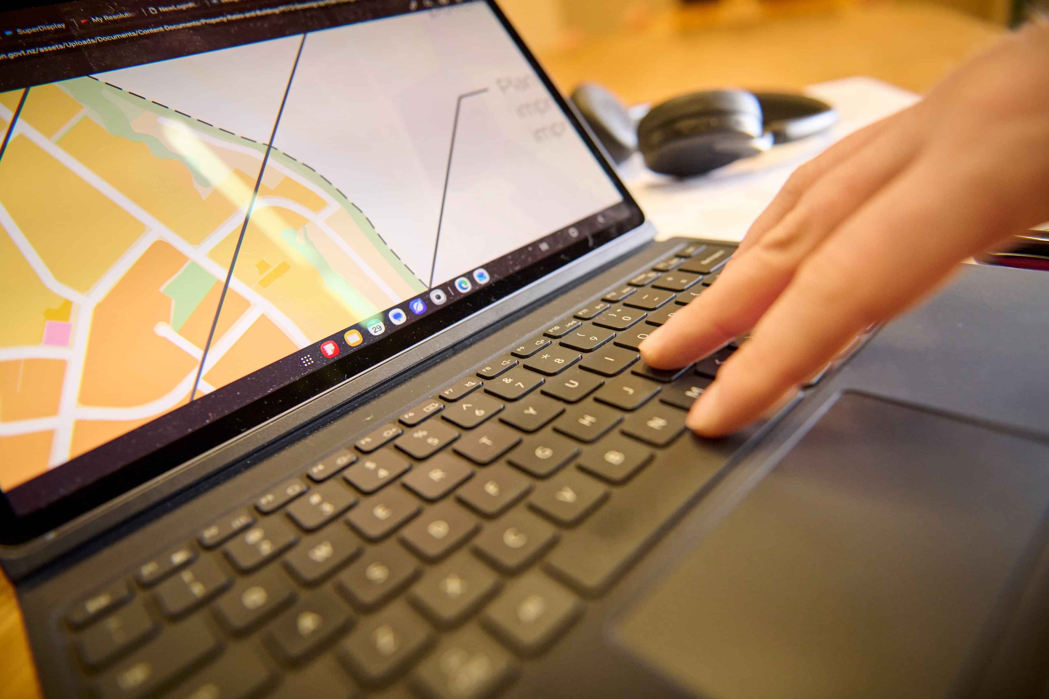 Person using a laptop for strategic planning, project management and business planning.