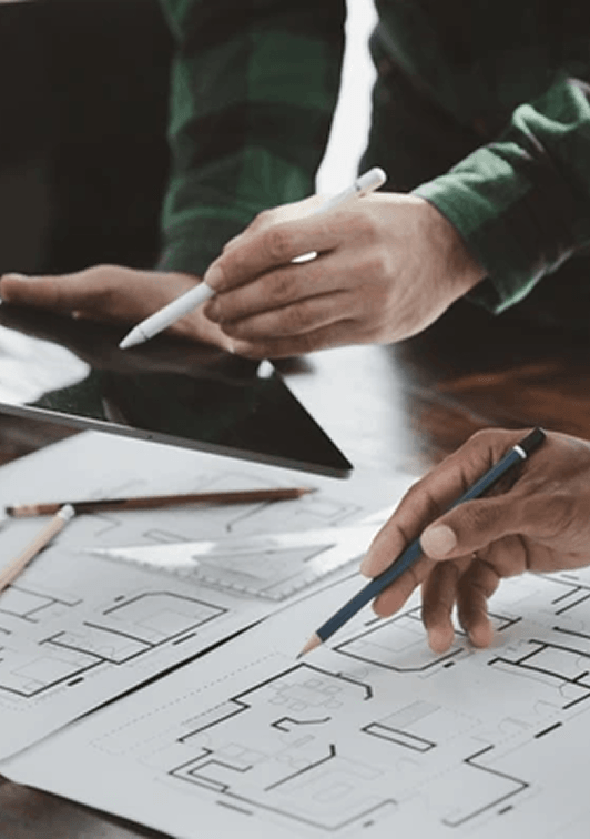 People reviewing building plans