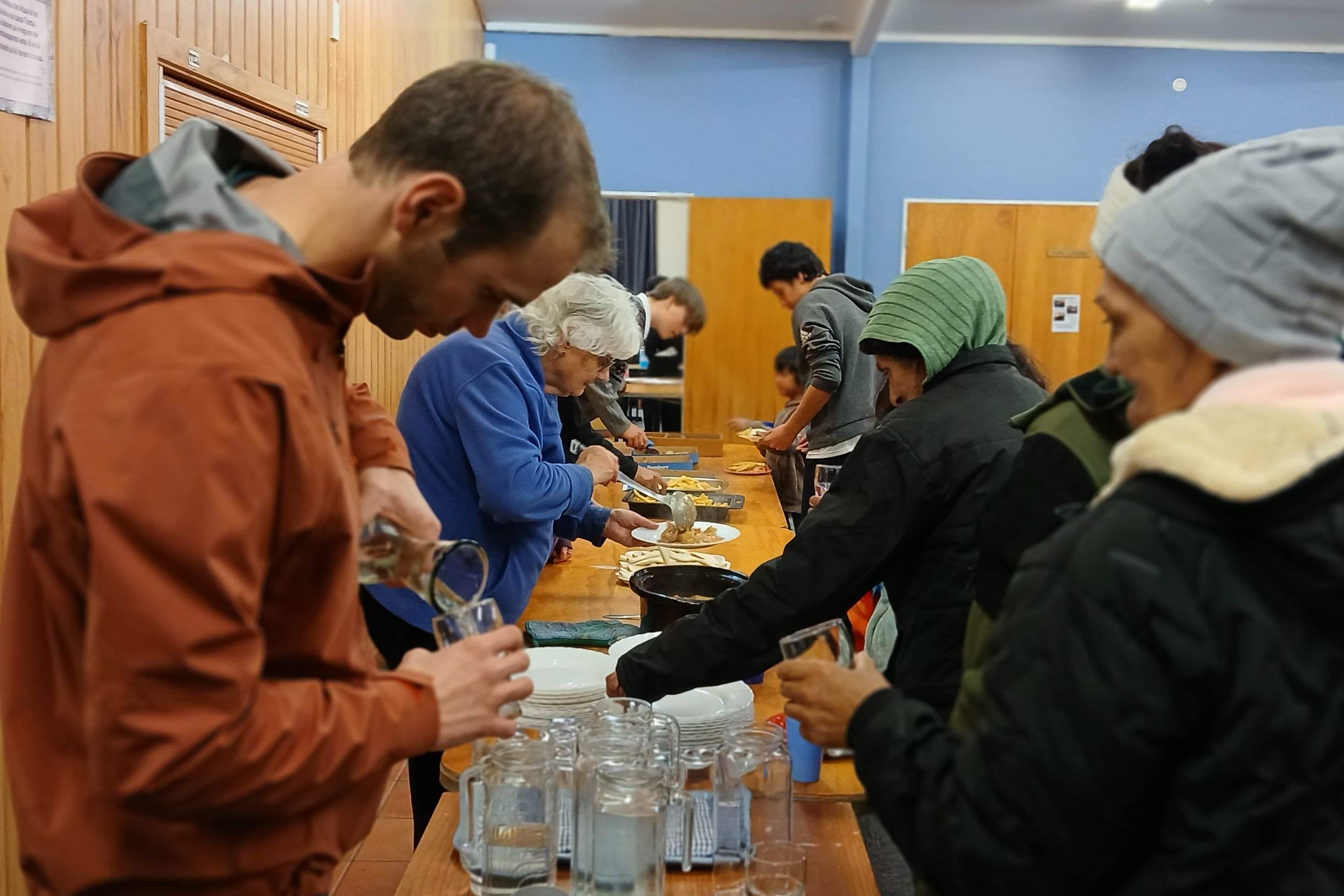 Image of people serving food