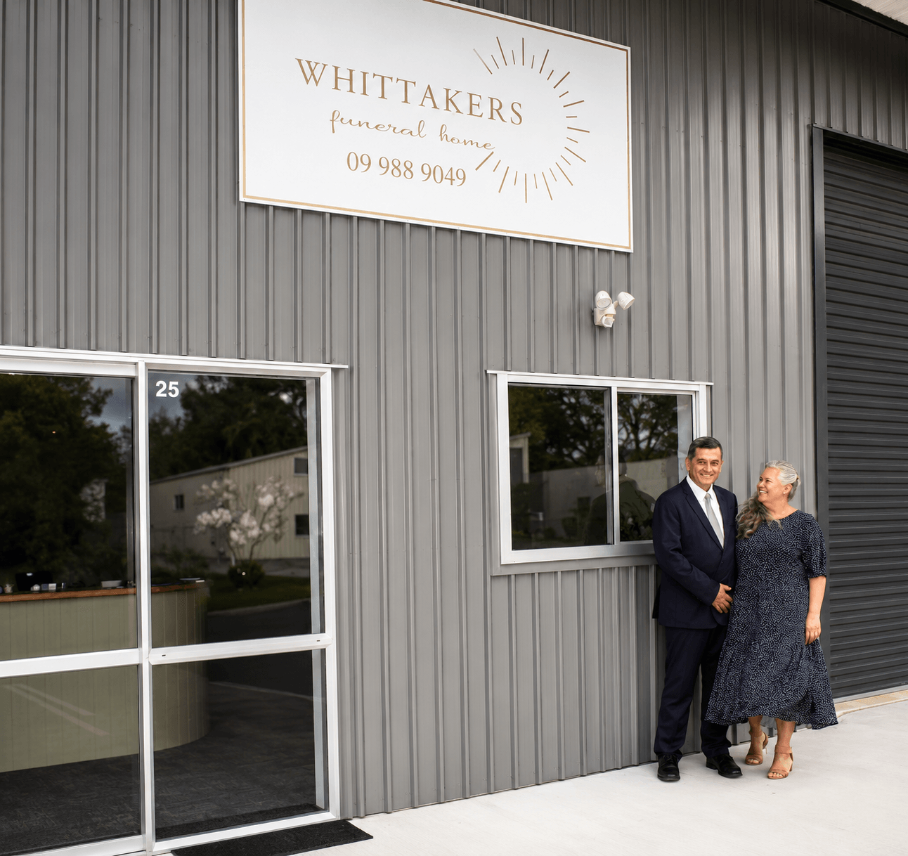 •Eldon and Leslee Whittaker, owners of Whittakers Funerals, outside their Ruakaka funeral home