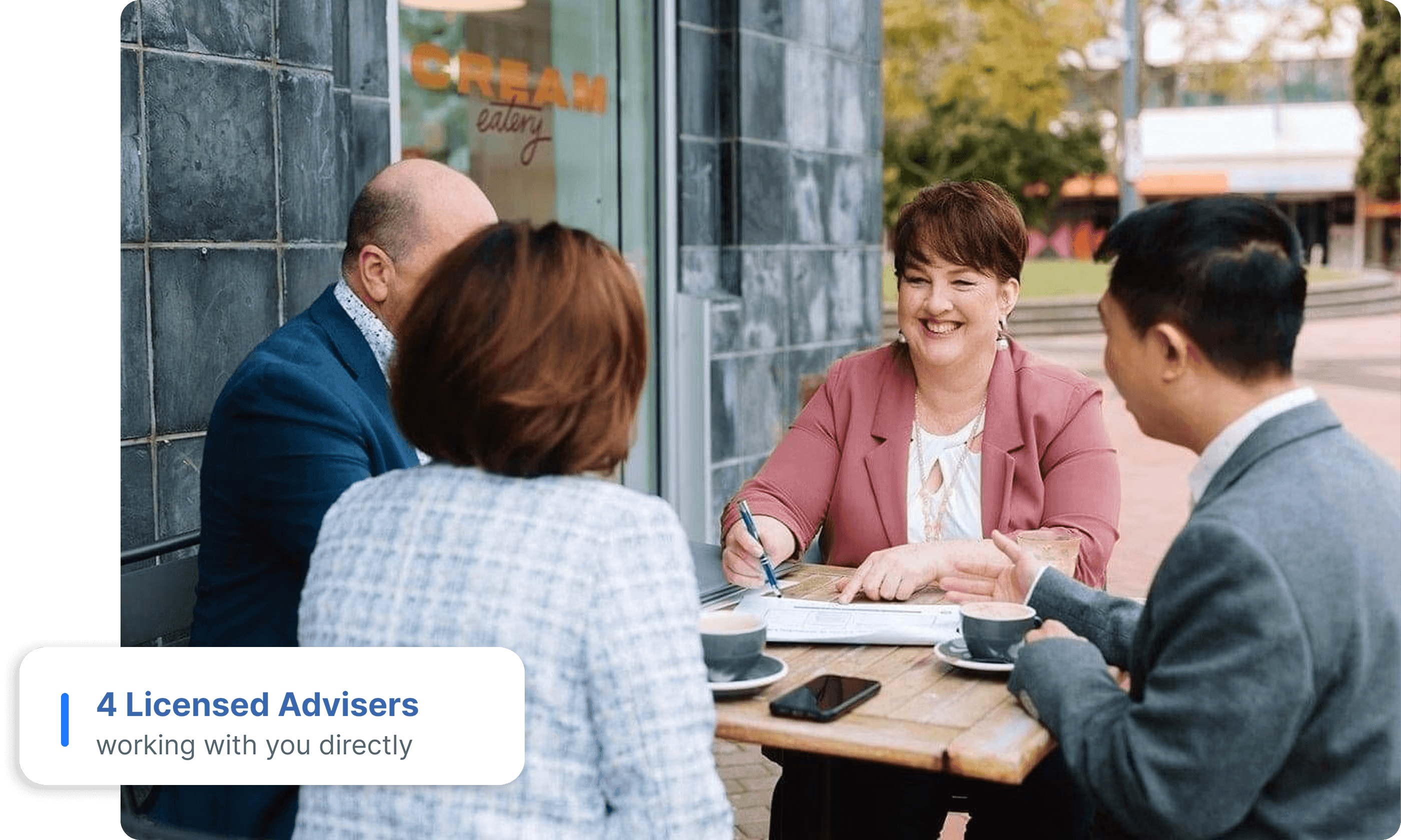 Neazor Brady immigration advisers meeting with clients around a table