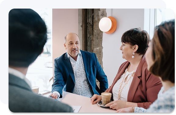 Neazor Brady advisers meeting with clients in a boardroom
