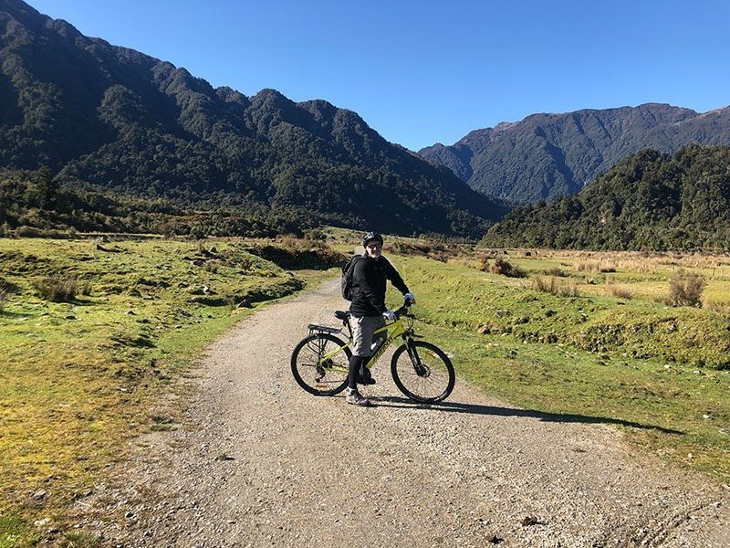 Pose for a photo along the West Coast Wilderness Trail