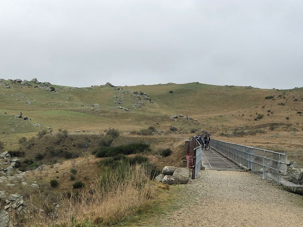 Peering over a bridge along the Otago Central Rail Trail