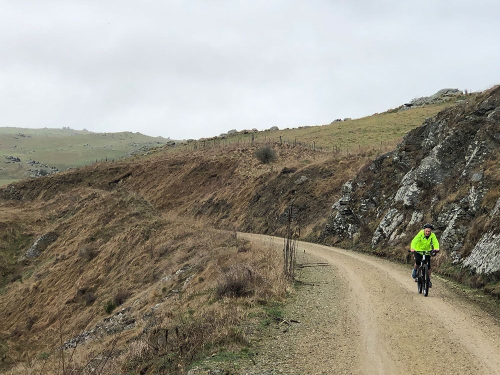 Rider on the trail of the Otago Central Rail Trail