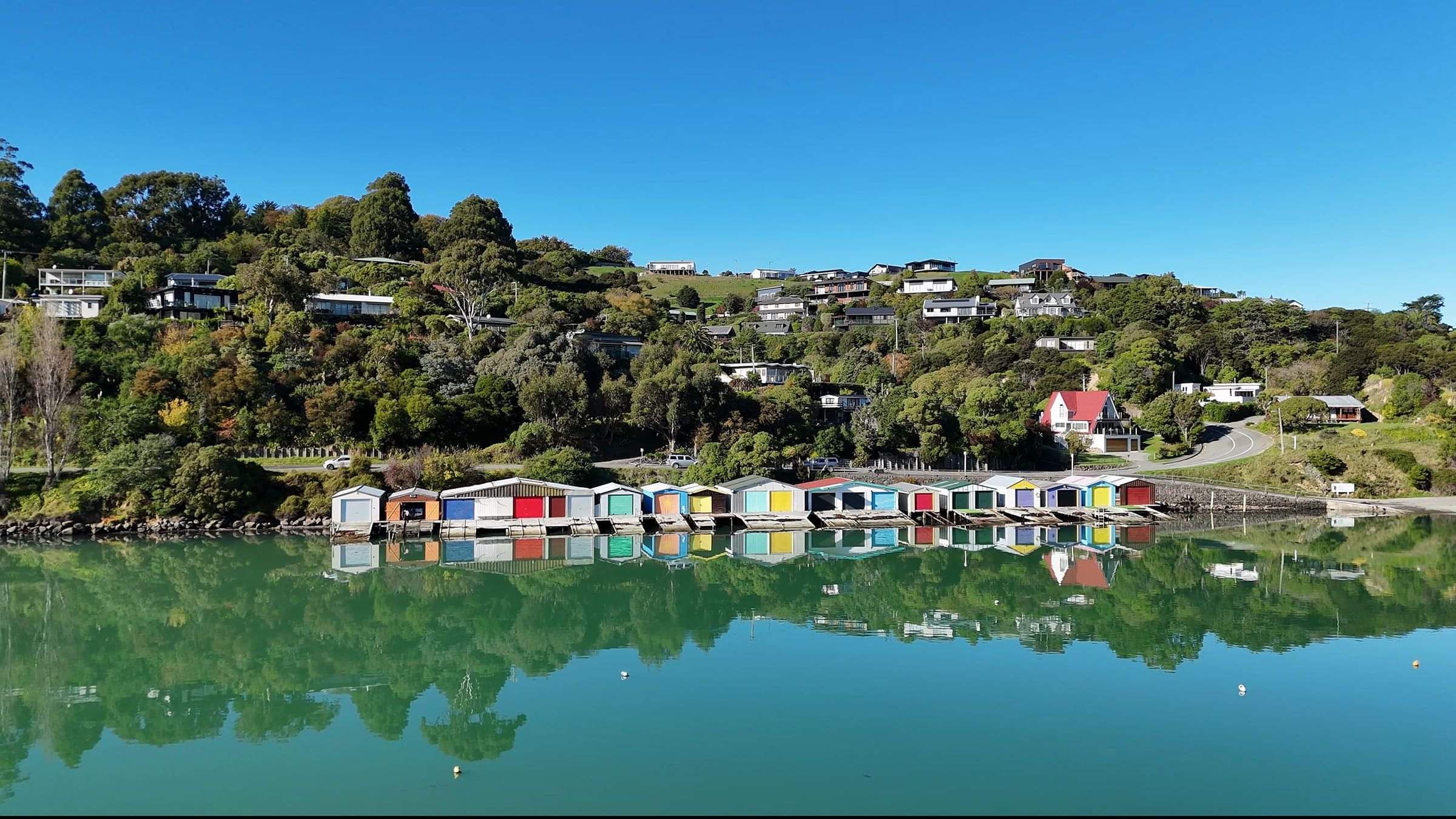 The colourful boat sheds at Akaroa harbour