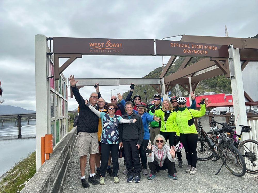 Holiday makers at the start of the West Coast Wilderness Trail