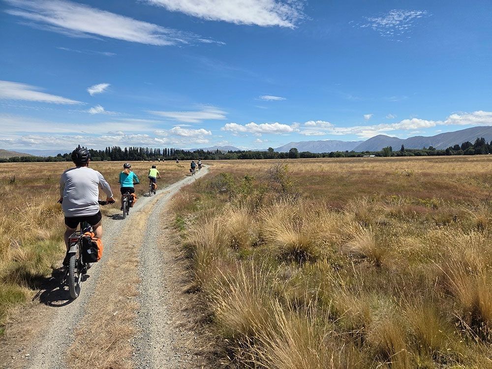 A group of riders on the track in a self-guided tour