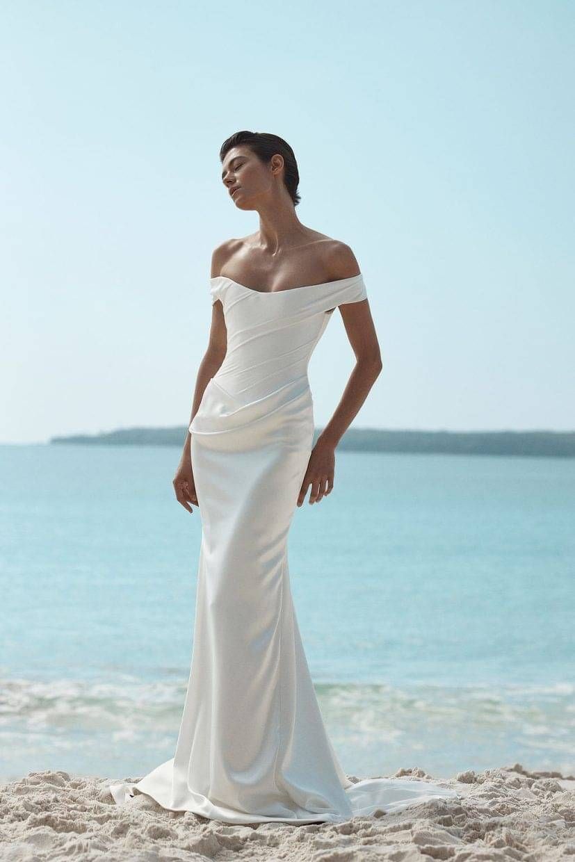 Bride wearing KYHA Nia wedding dress from Paperswan Bride